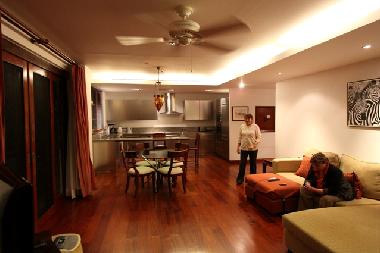 Spacious living room with open plan kitchen