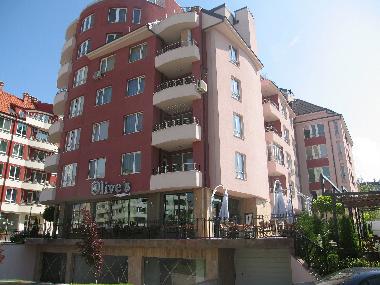 Building with restaurant Olive`s