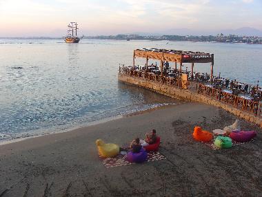 sit in bar and watch the boats go by..