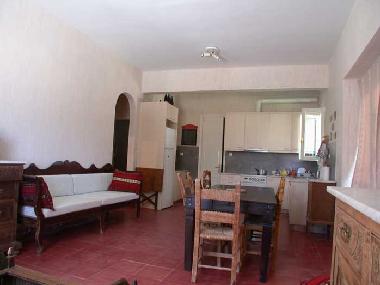 the living room and the kitchen