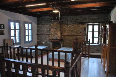 Main room in upper floor, 2 beds