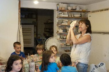 Jeannette working with children in the "Kadaria" on site
