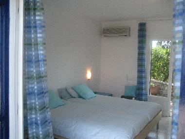 Blue Master Bedroom with Two Terrace Accesses