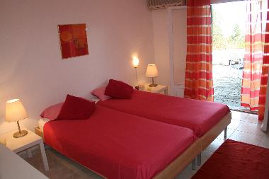 Peach Bedroom with Access to Small East Terrace