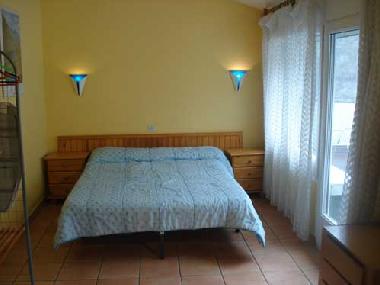 The bedroom and terrace