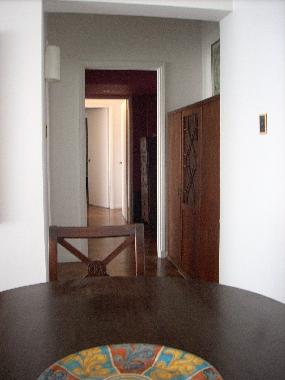 view from dining room to lobby and to bedroom circulation