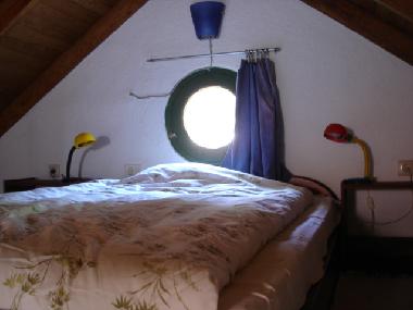 Sleeping accommodation in the loft of apartment 5