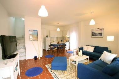 Living room with open kitchen