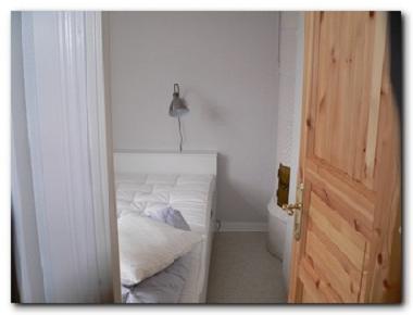 Bedroom with enamel stove