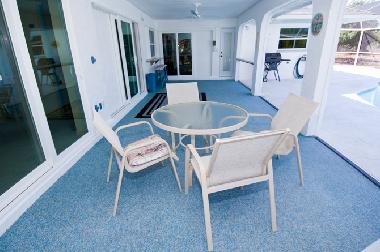 sitting on the roofed lanai