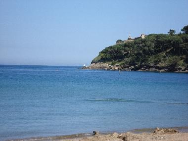 Capofocardo Lighthouse seen from the beach