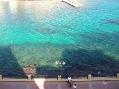 Sea and long promeande just under and opposite the apartment block (winter photo)
