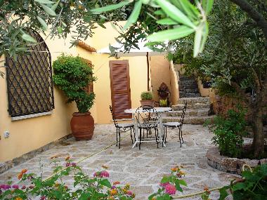 Main  bedroom private entrance with back garden