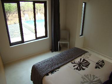 BushGlam Downstairs Queen bedroom looking into garden