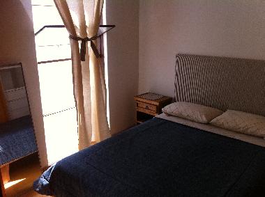 The bedroom with big waredrobe.