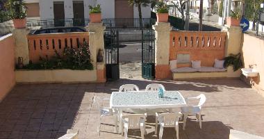 COURYARD WITH TABLE CHAIRS AND GAZEBO