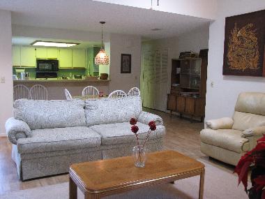 Living-dining room with view towards kitchen