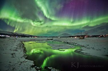 Northen lights over lake in Skorradalur valley. Only 15 minutes from our house