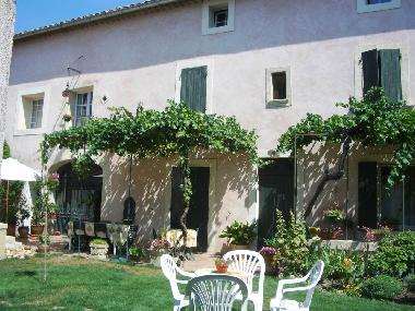 The apt is on the right handside when facing the house