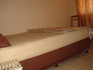 view from the side queen size bedroom second floor with a cupboard