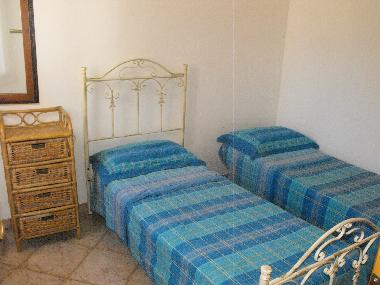 Bedroom with two single beds