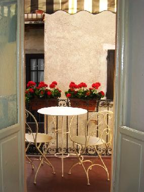 The balcony & terrace capture welcome alfresco winter sunshine; shaded by a canvas awning in summer