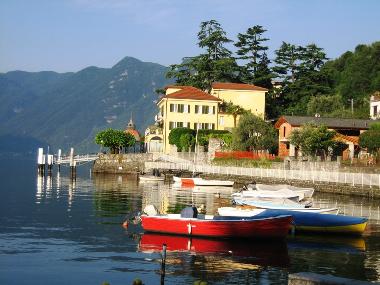View along the lake from the beach and pool towards Taverna Bleu