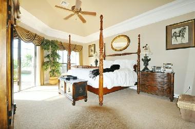 master bedroom with king-size bed