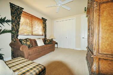 guest bedroom with queen-sleeper sofa