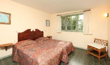 Apartment bedroom with twin beds