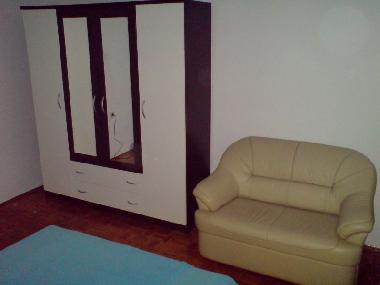 room 1, sofa and wardrobe