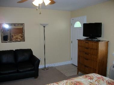 flat screen TV with cable and DVD-player and a dresser to store your clothes