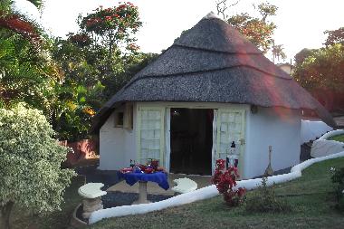 Cottage comprised of two traditional rondavels in afrcan style