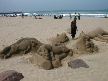 proud "sandartist" on the beach