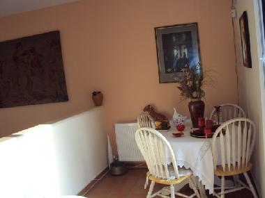 SITTING ROOM OUTSIDE THE STUDIO & BALCONY DOOR