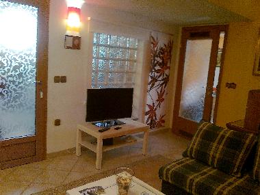 living area-on the right bedroom doors