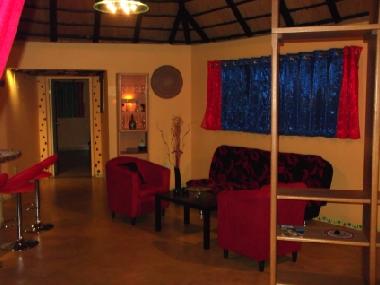 Living area with access to the bedroom