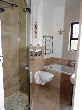 One of the three bathrooms