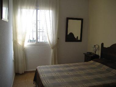 Master bedroom with built-in wardrobe