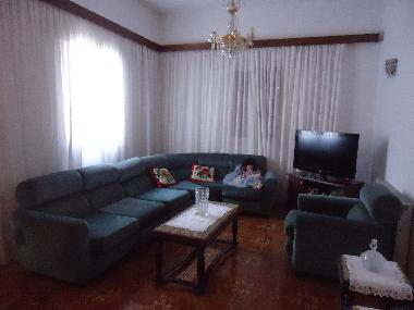 The living room with a wide screen TV