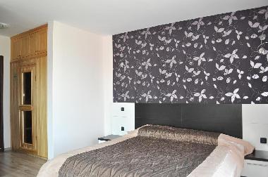 Master bedroom again with access to Sauna
