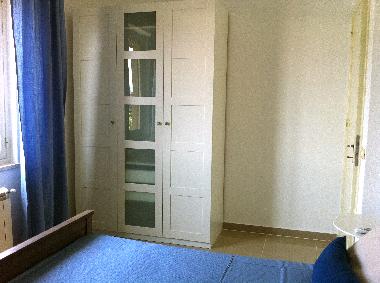 First bedroom. Detail of cabinet.