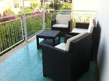 Terrace with garden furniture.