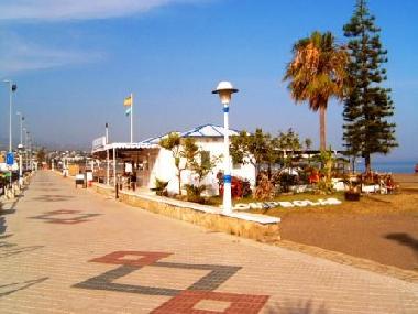 promenade with beach bar close to the house
