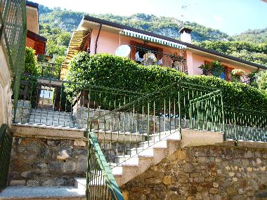 Exterior view up from the steps which leads to the swimming pool
