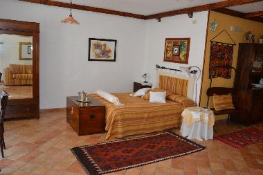 The romantic sleeping area of this Basilicata Villa