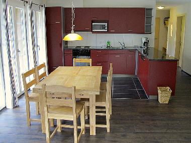 The kitchen with dining area