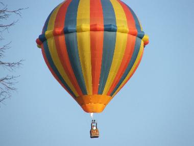 Hot Air Ballon over the cottage one summers day