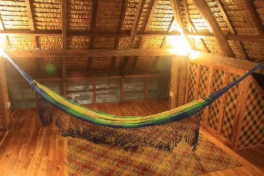 Hammock from Brazil, mats from Samar, Philippines.