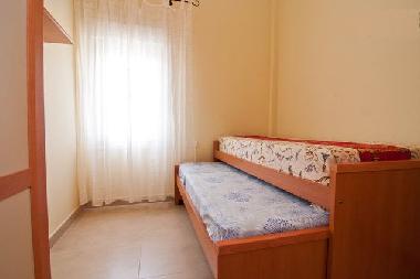 Sliding beds in the middle bedroom